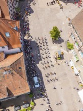 People gather on a large square near a building, 950 years Calw, parade Calw, Black Forest, Germany