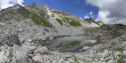 Koblatsee, a small mountain lake on the Koblat-Höhenweg in the nature reserve of the Allgäu High