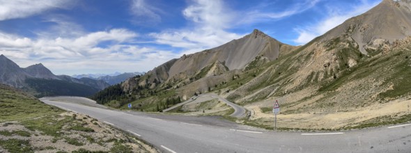 Northern ascent mountain road alpine road with serpentines above tree line shortly in front of pass