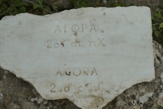 Inscribed ancient stone with inscription in various languages, Ancient Agora, Kos Town, Kos,