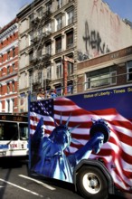 Open-top tourist bus in downtown, New York City, USA