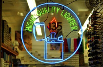 Illuminated advertising in a lighter shop, New York City, USA