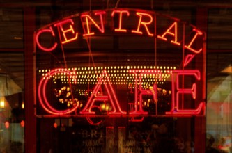 Illuminated advertising Central Café in Mahatten, New York City, USA