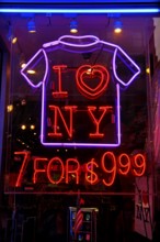 Illuminated advertising for T-shirts, New York City, USA
