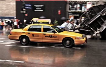 Wiping effect New York taxi in the rain, New York City, USA
