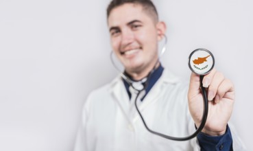Doctor showing stethoscope with Chipre flag. Chipre national healthcare concept