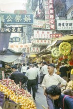 Captioned as 'Chinese fruit and flower stalls', Victoria, Hong Kong, Asia 1964