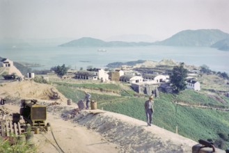 Captioned as 'Dairy land and road widening', Pok Fu Lam, Hong Kong, Asia 1964