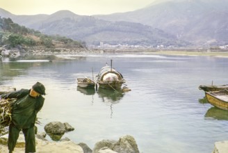 People living on sampan boats at Tai Po Hoi, New Territories, Hong Kong, Asia, 1964 woman carrying