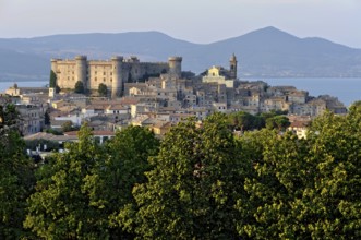 Castello Odescalchi fortress, Duomo Santo Stefano cathedral, behind Lake Bracciano, Lago di
