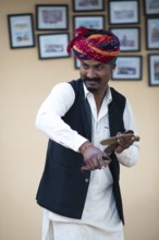 Rajasthani folk musicians with Rajasthani kartals or castanets, Jaisalmer, Rajasthan, India