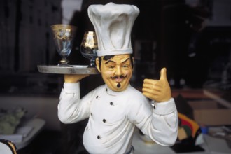 Figure of a cook, New York City, USA
