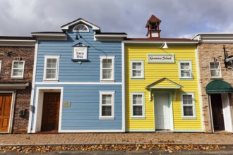 Replica, historic town hall, historic elementary school, colorful facades, signs with inscription,