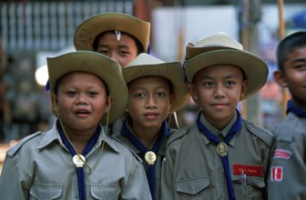 Young scouts at Damnoen Saduak floating market, Thailand, December 2002, vintage, retro, old,