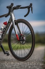 Detailed view of a bicycle shop in natural surroundings under cloudy sky, Triathlon, Calw, Germany
