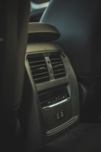 Ventilation grille in the interior of a car in dark colors, BMW i7 electric car, Deer e-Carsharing,