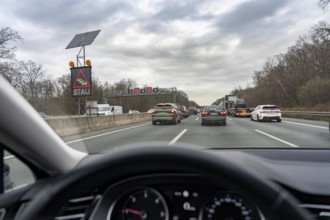 Traffic jam on the A3 motorway, direction Oberhausen, near Ratingen, solar-powered information