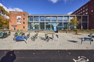 New town hall, tourist information, welcome center, brick building, modern building, glass façade,