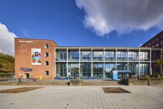 New town hall, tourist information, welcome center, brick building, modern architecture, glass