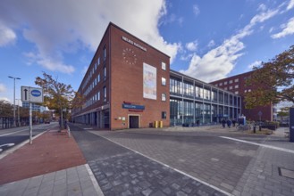 New town hall, brick building, modern architecture, façade with windows, glass façade, lantern,