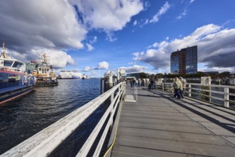 Kiel Fjord, station bridge, pier, wooden railings, wharf, ferries, harbor and sea tugs, ships,