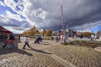 Pedestrian crossing with barrier, St. Andrew's cross, track bed, tracks, general architecture,