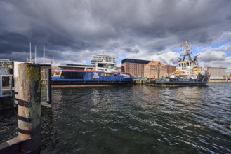 Kiel Fjord, harbour, wharf, dock, duckdalben, passenger ship Düsternbrook, harbour tug and sea tug