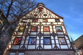Historic Pilate House with the annual advent calendar in the evening light, Tiergärtnertor,