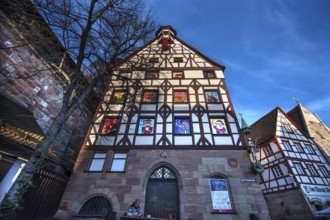 Historic Pilate House with the annual advent calendar in the evening sun, Tiergärtnertor,
