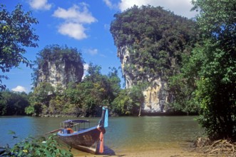 Longtail boat on the banks of the tidal river near Krabbi, two years in front of the tsunami,