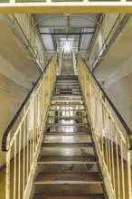 Central staircase in the interior of the former Stasi prison Bautzen II, today a memorial in