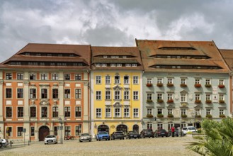 Baroque town houses with city pharmacy and traditional Goldener Adler hotel on the main market in