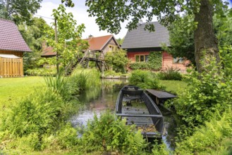 Canal and residential buildings in the Spreewald near Lübbenau/Spreewald, Brandenburg, Germany