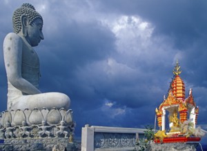 Buddha statue and shrine in Wat Tam Sua monastery, which is partly on the top of a mountain, Krabi,
