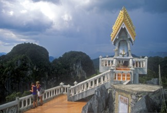 People, shrine in Wat Tam Sua monastery, which is partly on the top of a mountain, Krabi, Thailand,