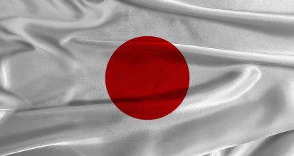Flag of Japan with fabric textured background. Close up of National flag of Japan with realistic