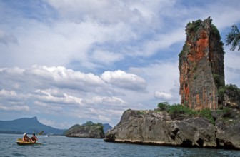 Boat, people, rocks in the sea, Krabi, Thailand, December 2002, vintage, retro, old, historic