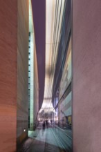 Evening reflection in the glass façade of the Neues Museum, State Museum of Art and Design,