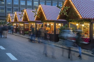 Christmas stands at the children's Christmas market in the evening, Hans Sachs Platz, Nuremberg,