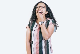 Funny young afro woman laughing on isolated background. Young woman in glasses laughing out loud