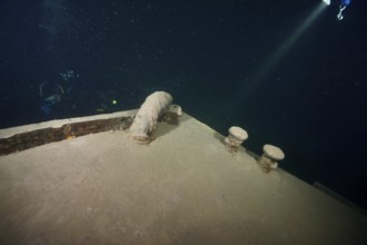 Divers examine a ledi wreck, wreck of a ledi ship, Ledi ship, cargo ship for mass freight, bulk