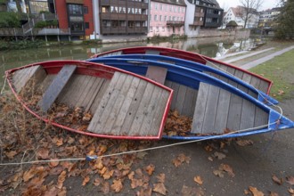 Assembled rowing boats on the banks of Pegnitz, river in Nuremberg, Middle Franconia, Bavaria,