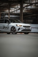 Opel car sharing vehicle with urban flair in an industrial setting, Deer E-Car Sharing, Motorworld