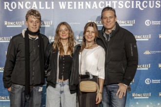 Sascha Vollmer (The BossHoss) with his woman Jennifer Vollmer and their children Johnny and