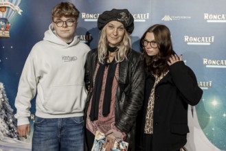 Jeanette Hain with her children Henry and Malou at the premiere of the 21st Original Roncalli