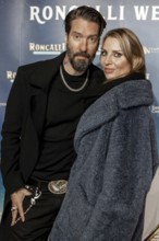 Alec Völkel with woman Johanna Völkel at the premiere of the 21st Original Roncalli Christmas