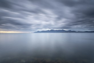 The Vestfjord in Nordland, Norway, near Bodø, impresses with a dramatic atmosphere. Dark clouds
