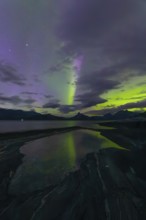 The Vestfjord in Nordland, Norway, has an enchanting atmosphere at night. Dark clouds and vivid