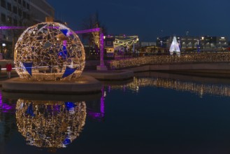 Christmas decoration in Kiel at the boat harbor, festive lighting, lights, Christmas ball, shops,