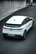 Rear view of a white modern SUV on a paved road, Deer e-car sharing, Renault Megane, Calw, Germany